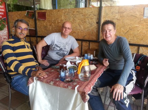 Having a bite to eat with our escort from town. 