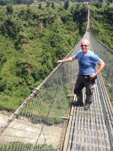 Steve on the longest suspension bridge in Nepal. Yeh, it's certainly long when you start to walk on it!